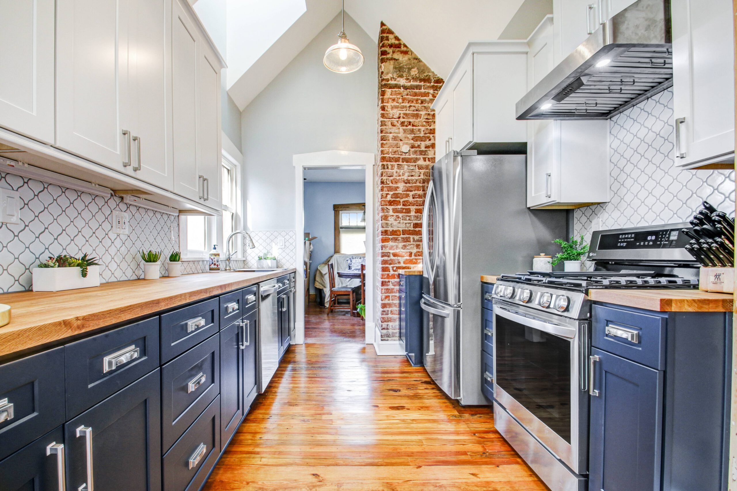 What kind of storage solutions work best in a kitchen design?